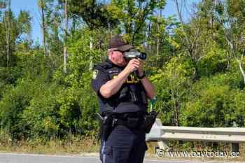 Police arrest and charge a driver with drug related offences after traffic stop