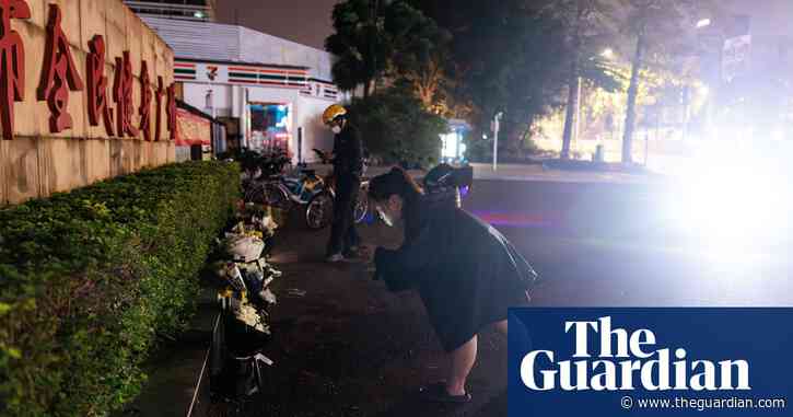 China: people hold vigil at scene where driver killed dozens of people – video