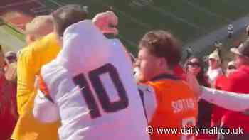 Shocking moment NFL security guard is viciously attacked as wild brawl breaks out at Broncos-Chiefs game