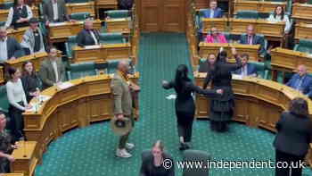 Moment New Zealand Maori MPs disrupt parliament with haka in protest against treaty bill