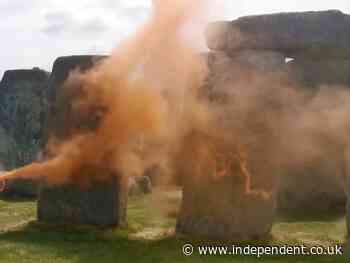 Two people charged by police after orange paint was thrown at Stonehenge in Just Stop Oil protest