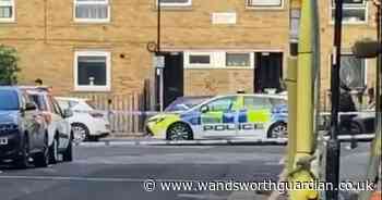 Man in his 20s in hospital after being stabbed near busy London station