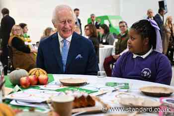 Charles makes birthday visit to surplus food project