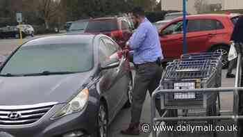 Moment heroic supermarket worker smashes customer's car in parking lot as smoke rips through vehicle