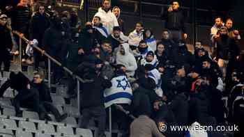 France tie with Israel amid brief clashes in stands