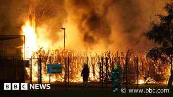 Children evacuated from football ground fire