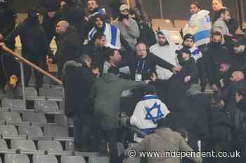 Israel and France fans clash during football match amid large police presence