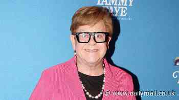 Sir Elton John, 77, showcases his dramatic weight loss in a quirky pink suit at the opening of his Broadway show following drastic diet change