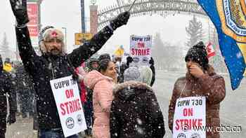 Edmontonians face mail disruptions as local postal workers walk off the job