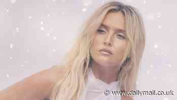 Braless Perrie Edwards stuns in clinging sheer white dress as she she shares promo image for her new Christmas single