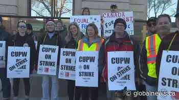 Lethbridge postal workers picket downtown during nationwide Canada Post strike