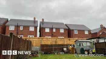 Row continues over houses built too high