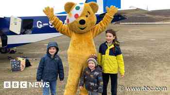 Pudsey flies in to meet children on Fair Isle