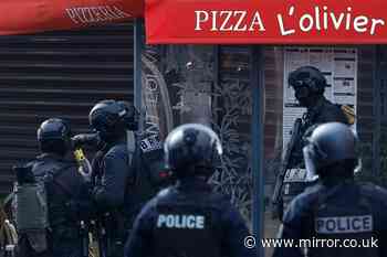 Paris siege: Knifeman takes hostages inside pizza restaurant as police flood scene