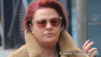 Lisa Armstrong shows off her newly-dyed red hair as she arrives at Blackpool Tower to makeover the Strictly stars