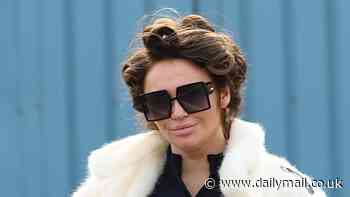 Pregnant Charlotte Dawson opts for cosy glam look as she wraps up in white fur coat and sports hair rollers after revealing she is learning to forgive fiancé Matthew Sarsfield amid sexting scandal