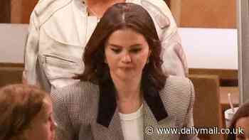 Selena Gomez rocks a tasteful sportcoat while enjoying pizza with her sister in Beverly Hills