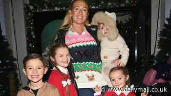 Paris Fury gets into the Christmas spirit with her children as she enjoys an evening at Santa's grotto in Manchester