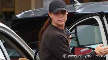 Kate Ritchie is seen back behind the wheel of a car for the first time since her multi-vehicle crash