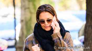 Katie Holmes is casual-chic in brown plaid jacket as she takes a call on way to Our Town performance in NYC