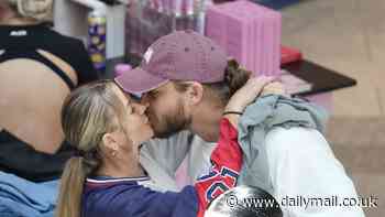 Skye Wheatley packs on the PDA with her partner Lachlan in a shopping mall as they reunite five days after announcing their separation