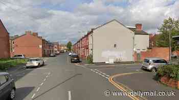 Double murder investigation launched in Manchester after two people found stabbed to death in the street