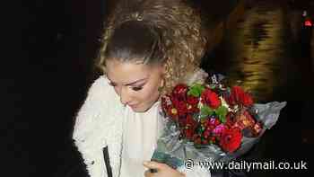 Jowita Pryzstal is beaming as she heads to Strictly afterparty clutching flowers from Pete Wicks after Blackpool special