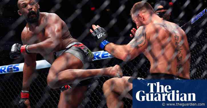 Jon Jones knocks out Stipe Miocic to retain UFC title as Trump looks on