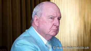 Alan Jones is arrested in his luxury apartment over allegations he indecently assaulted, groped or inappropriately touched multiple young men