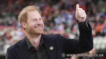 The pundit prince! Harry waves to fans as he makes surprise pitchside appearance at Canadian cup final