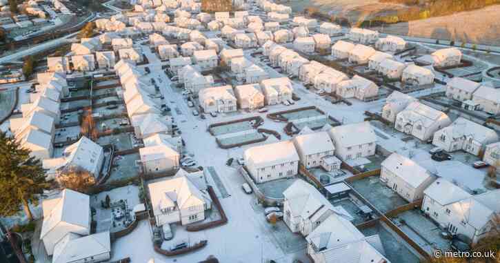 There’s nothing suspicious about this picture of roofs covered in snow