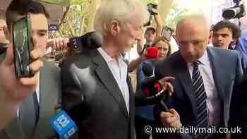 Heated moment Alan Jones' lawyer Chris Murphy confronts reporter outside court - and accuses him of shocking act: 'Now get back'