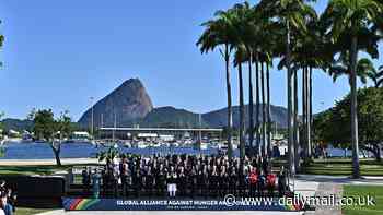 Moment reporters frantically search for checked out Biden as lame duck president misses photo with G20 leaders: 'He's behind the palm tree!'