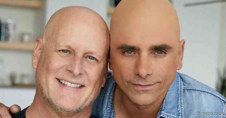 John Stamos disgusts fans for posing in bald cap after co-star’s ‘aggressive’ cancer diagnosis