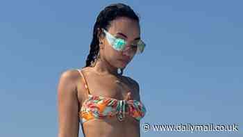 Leigh-Anne Pinnock flaunts her jaw-dropping figure in a colourful patterned bikini as she enjoys lavish family Dubai getaway