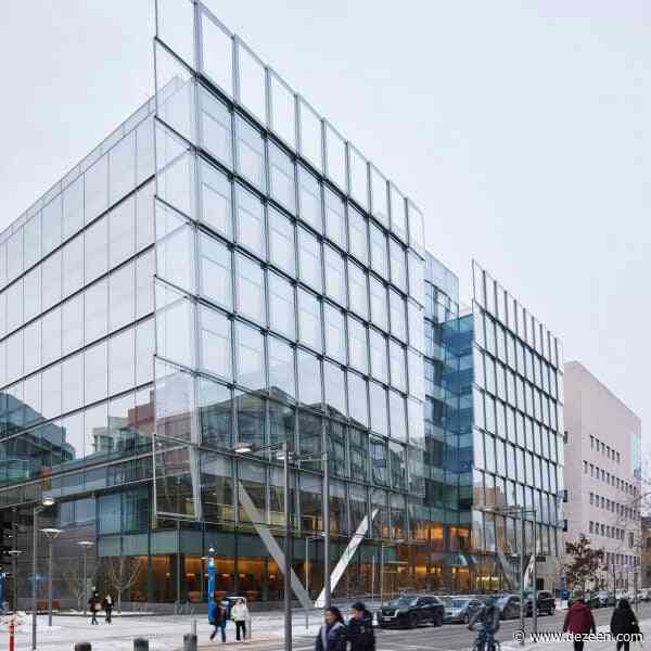 SOM covers computing college at MIT in large glass shingles