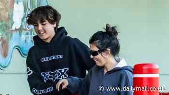 Kourtney Kardashian's son Mason, 14, towers over her during grocery store run in LA