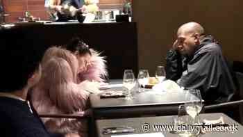 Kanye West and Bianca Censori look bored during dinner date in Tokyo