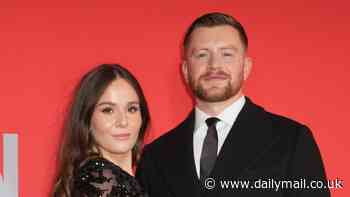 Holly Ramsay wows in a sexy sheer lace gown as she cosies up to dapper fiancé Adam Peaty at the GQ Men Of The Year awards