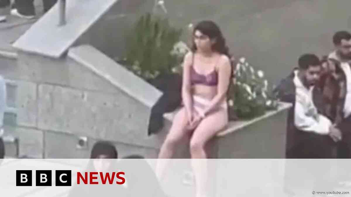 Iranian woman detained over undressing is released without charge | BBC News