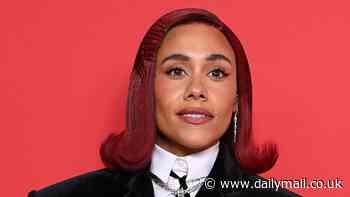 Alex Scott shows off a preppy new look as she rocks a red wig and structured velvet blazer for the GQ Men Of The Year Awards