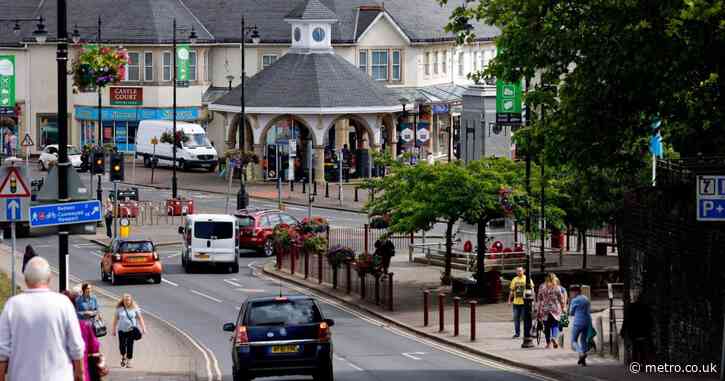 Girl, 14, and man fighting for life after van crashes into people in town centre