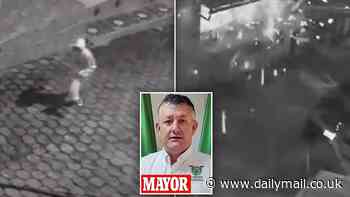 Terrifying moment explosive is hurled at mayor's home