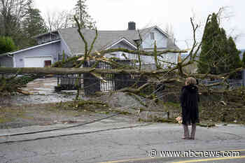 Washington state reels from bomb cyclone as atmospheric river drenches California