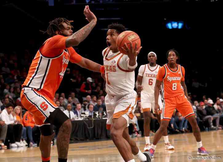 Texas squanders big lead, hangs on to beat Syracuse 70-66 in New York