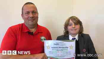 Fundraiser, 11, given honorary award by charity