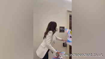 Nancy Mace tears down trans bathroom posters and throws them in trash in response to bill protest