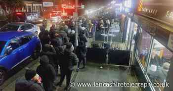 Huge queues in Blackburn as takeaway hands out free meals