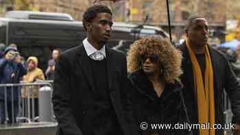 Diddy blows kisses, forms a prayer sign and taps his heart when he sees his family in court for his THIRD attempt at bail