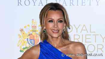 Vanessa Williams turns heads in a vibrant blue ruched gown as she steps out in London for the Royal Variety Show